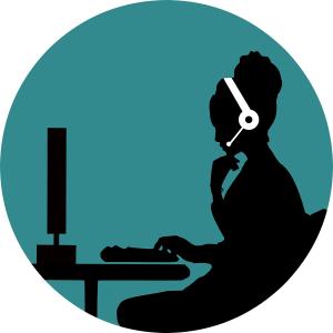 Image of receptionist on phone and computer