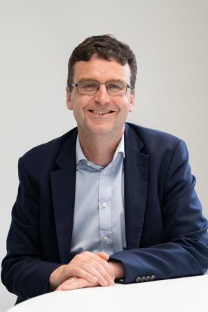 A headshot image of Paul Smith